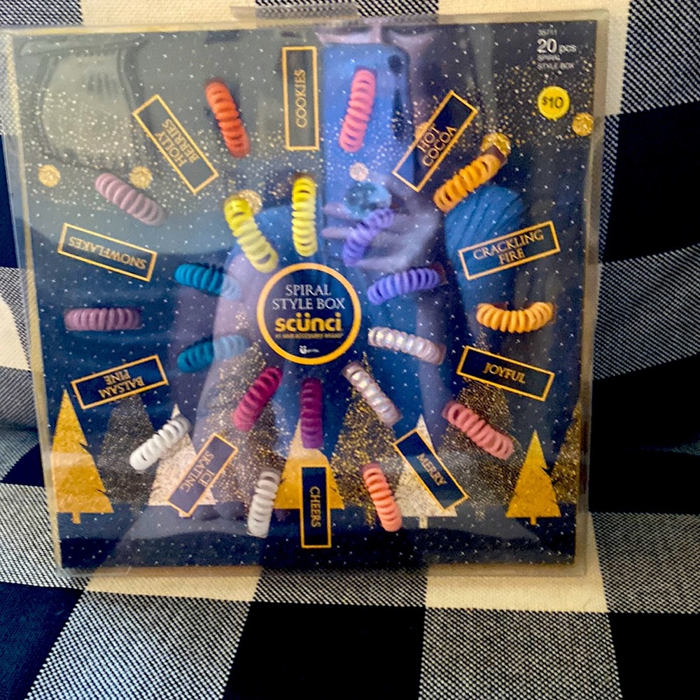 Never been opened pack of scunci spiral hair accessories!! Multi colored